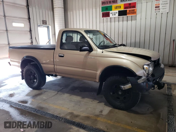 1998 Toyota Tacoma with VIN 4TAPM62N3WZ121359, listed as a Copart auction lot 63473485 with 133,472 mi miles and Salvage title. Bid and sale history available at DreamBid. Image 4.