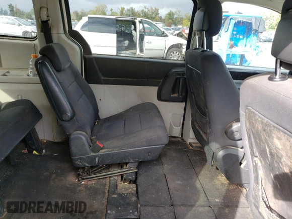 2010 Dodge Grand Caravan SXT with VIN 2D4RN5D11AR331804, listed as a Copart auction lot 73735873 with 183,923 mi miles and Salvage Title. Bid and sale history available at DreamBid. Image 11.