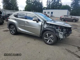 2021 Lexus NX 300h with VIN JTJGJRDZ2M2167458, listed as a Copart auction lot 57650945 with 14,653 mi miles and Salvage title. Bid and sale history available at DreamBid. Image 4.
