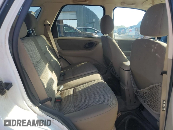 2004 Ford Escape XLT with VIN 1FMYU93104KA32047, listed as a Copart auction lot 61364985 with 160,822 mi miles and Salvage title. Bid and sale history available at DreamBid. Image 11.