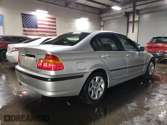 2003 BMW 3 Series 325xi with VIN WBAEU33453PM52318, listed as a Copart auction lot 52195535 with 104,018 mi miles and Salvage Title. Bid and sale history available at carsss.com. Image 3.