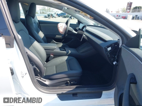 2025 Tesla Model 3 Long Range with VIN 5YJ3E1EA4SF903567, listed as a IAAI auction lot 42453246 with 19,365 mi miles and . Bid and sale history available at DreamBid. Image 5.