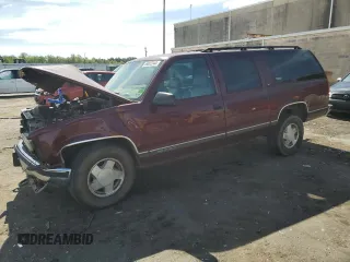 1998 GMC Suburban z VIN 3GKFK16R1WG503206, wystawiony jako Copart lot #69802344 z przebiegiem 231 148 mil mil oraz Szkody całkowita. Historia ofert i sprzedaży dostępna na DreamBid. Obrazek 1.