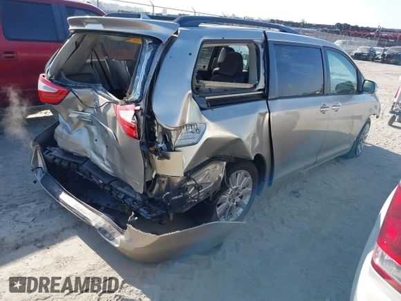 2015 Toyota Sienna XLE with VIN 5TDYK3DC0FS632909, listed as a IAAI auction lot 42012143 with 97,084 mi miles and . Bid and sale history available at DreamBid. Image 4.
