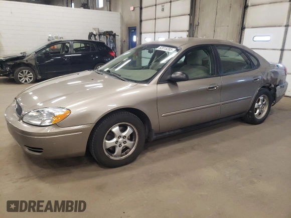 2005 Ford Taurus SE with VIN 1FAFP53U15A276082, listed as a Copart auction lot 52015285 with 103,479 mi miles and Salvage Title. Bid and sale history available at carsss.com. Image 1.