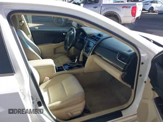 2014 Toyota Camry SE with VIN 4T1BK1FK2EU543220, listed as a IAAI auction lot 41416785 with 198,011 mi miles. Bid and sale history available at carsss.com. Image 5.