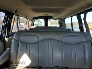 2001 GMC Savana z VIN 1GJHG39R611243625, wystawiony jako Copart lot #77851834 z przebiegiem 323 703 mil mil oraz Czysty tytuł • Clean title. Historia ofert i sprzedaży dostępna na DreamBid. Obrazek 10.