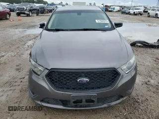 2014 Ford Taurus SE z VIN 1FAHP2D86EG143517, wystawiony jako Copart lot #51066975 z przebiegiem 134 892 mil mil oraz Szkoda całkowita • Salvage title. Historia ofert i sprzedaży dostępna na DreamBid. Obrazek 5.