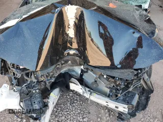 2023 Toyota Corolla LE z VIN JTDB4MEE4P3015232, wystawiony jako Copart lot #56208955 z przebiegiem 35 623 mil mil oraz Szkoda całkowita • Salvage title. Historia ofert i sprzedaży dostępna na DreamBid. Obrazek 11.