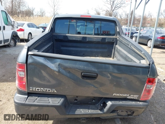 2011 Honda Ridgeline RT z VIN 5FPYK1F26BB453191, wystawiony jako IAAI lot #41776280 z przebiegiem 122 908 mil mil oraz . Historia ofert i sprzedaży dostępna na DreamBid. Obrazek 16.