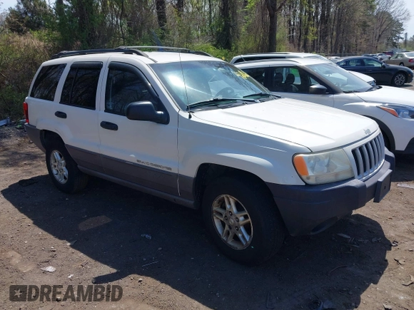 2004 Jeep Grand Cherokee Laredo with VIN 1J4GW48S54C314056, listed as a IAAI auction lot 42096065 with 164,113 mi miles. Bid and sale history available at carsss.com. Image 1.