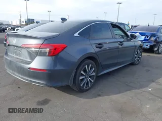 2022 Honda Civic Sedan EX with VIN 2HGFE1F70NH310515, listed as a IAAI auction lot 41720423 with 85,182 mi miles. Bid and sale history available at carsss.com. Image 4.