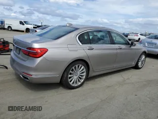 2018 BMW 7 Series 740i with VIN WBA7E2C59JG741689, listed as a Copart auction lot 50948855 with 96,337 mi miles and Salvage Title. Bid and sale history available at carsss.com. Image 3.