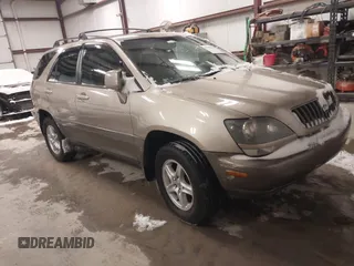 1999 Lexus RX 300 Luxury SUV with VIN JT6GF10U6X0043457, listed as a IAAI auction lot 41606539 with 209,007 mi miles. Bid and sale history available at carsss.com. Image 1.