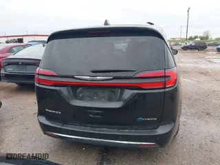 2023 Chrysler Pacifica Hybrid Touring L with VIN 2C4RC1L71PR554435, listed as a IAAI auction lot 41901500 with 53,373 mi miles. Bid and sale history available at carsss.com. Image 17.