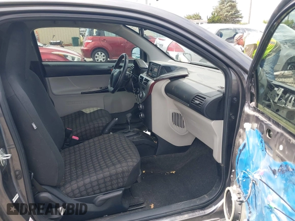 2012 Scion iQ with VIN JTNJJXB00CJ018659, listed as a IAAI auction lot 42232715 with 142,516 mi miles and . Bid and sale history available at DreamBid. Image 5.