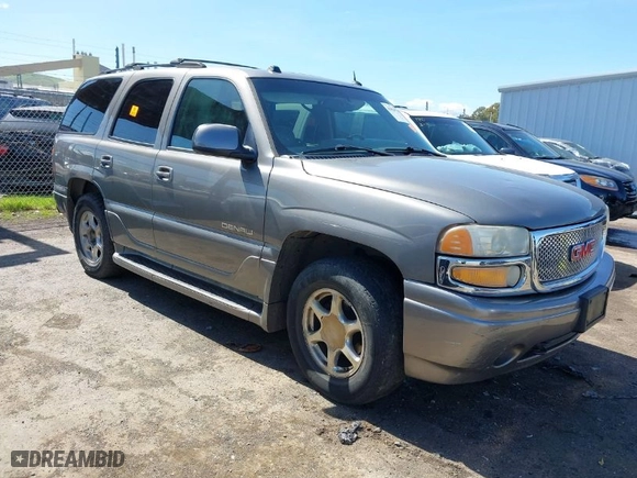 2005 GMC Yukon Denali with VIN 1GKEK63U35J149963, listed as a IAAI auction lot 41829530 with 243,575 mi miles. Bid and sale history available at carsss.com. Image 1.