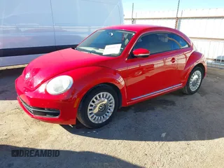 2013 Volkswagen Beetle with VIN 3VWHX7AT3DM682758, listed as a IAAI auction lot 40869170 with 88,793 mi miles and . Bid and sale history available at DreamBid. Image 17.