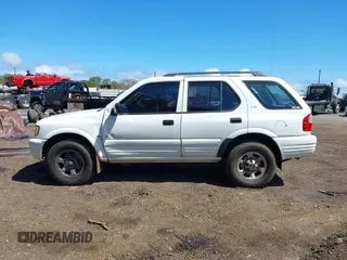 2000 Isuzu Rodeo S with VIN 4S2CK58W6Y4355597, listed as a IAAI auction lot 41775764 with 122,776 mi miles. Bid and sale history available at carsss.com. Image 14.