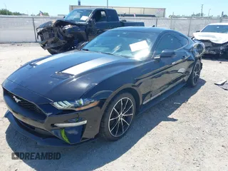 2021 Ford Mustang EcoBoost with VIN 1FA6P8TH1M5137372, listed as a IAAI auction lot 42031716 with 58,475 mi miles and . Bid and sale history available at DreamBid. Image 18.