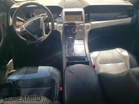 2013 Ford Taurus Limited with VIN 1FAHP2J83DG142778, listed as a Copart auction lot 54799235 with 131,157 mi miles and Clean title. Bid and sale history available at DreamBid. Image 8.