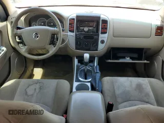 2005 Mercury Mariner Luxury с VIN 4M2YU56165DJ14518, выставлен на аукционе Copart как лот 53253965 с пробегом 186 678 миль миль и Списание • Salvage title. История ставок и продаж доступна на DreamBid. Изображение 8.