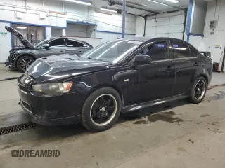 2014 Mitsubishi Lancer SE with VIN JA32V2FWXEU006145, listed as a Copart auction lot 44050135 with 154,377 mi miles and Salvage Title. Bid and sale history available at carsss.com. Image 1.