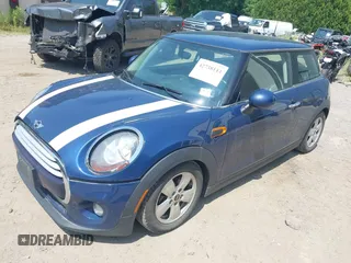 2014 MINI Hardtop with VIN WMWXM5C50ET972174, listed as a IAAI auction lot 42738144 with 106,273 mi miles and . Bid and sale history available at DreamBid. Image 2.