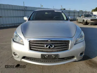 2012 Infiniti M with VIN JN1BY1AP9CM336121, listed as a Copart auction lot 71656374 with 125,497 mi miles and Salvage Title. Bid and sale history available at DreamBid. Image 5.