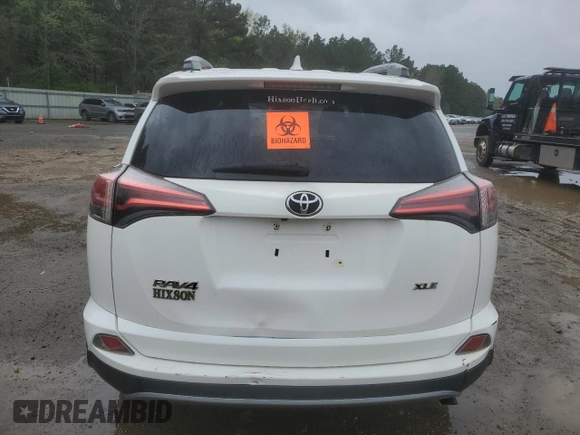 2018 Toyota RAV4 XLE with VIN 2T3WFREV9JW405921, listed as a Copart auction lot 50695175 with 133,019 mi miles and Salvage Title. Bid and sale history available at carsss.com. Image 6.