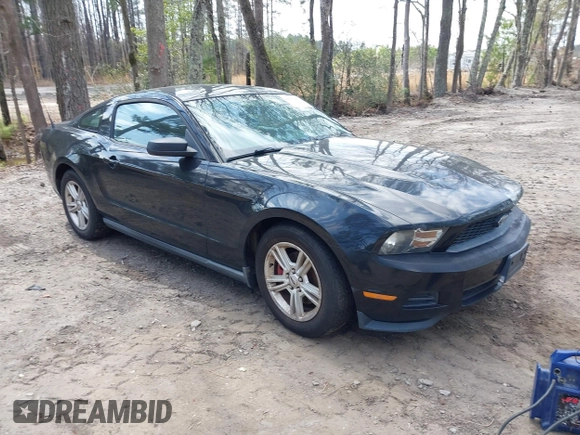 2012 Ford Mustang V6 Premium with VIN 1ZVBP8AM1C5205321, listed as a IAAI auction lot 41877052 with 120,412 mi miles. Bid and sale history available at carsss.com. Image 1.