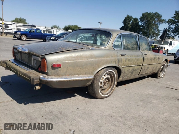 1974 Jaguar XJ with VIN UE2T52398, listed as a Copart auction lot 59589415 with 93,740 mi miles and Clean title. Bid and sale history available at DreamBid. Image 3.