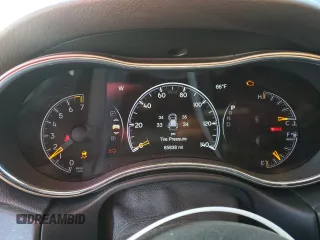 2018 Jeep Grand Cherokee Altitude with VIN 1C4RJFAGXJC296051, listed as a Copart auction lot 53450135 with 65,838 mi miles and Salvage title. Bid and sale history available at DreamBid. Image 9.
