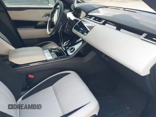 2020 Land Rover Range Rover Velar R-Dynamic S z VIN SALYK2EX9LA261388, wystawiony jako IAAI lot #42156695 z przebiegiem 35 310 mil mil oraz . Historia ofert i sprzedaży dostępna na DreamBid. Obrazek 5.