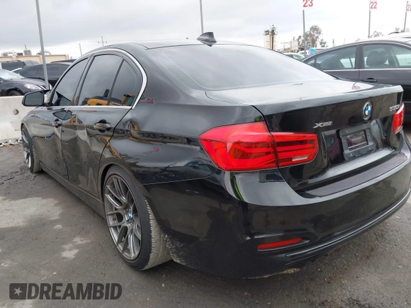 2018 BMW 3 Series 330i xDrive with VIN WBA8D9G57JNU67415, listed as a IAAI auction lot 41513343 with 98,714 mi miles. Bid and sale history available at carsss.com. Image 3.