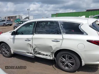 2020 Infiniti QX60 Luxe with VIN 5N1DL0MM2LC506031, listed as a IAAI auction lot 42701561 with 31,424 mi miles and . Bid and sale history available at DreamBid. Image 14.
