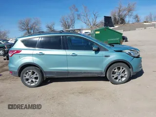 2013 Ford Escape SEL with VIN 1FMCU9HX2DUA71931, listed as a IAAI auction lot 41757318 with 149,344 mi miles. Bid and sale history available at carsss.com. Image 13.
