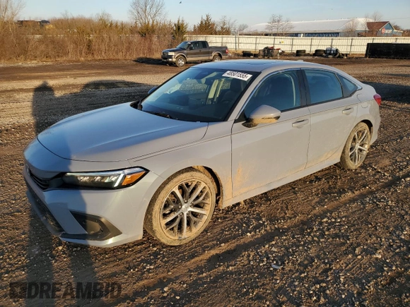 2022 Honda Civic Touring z VIN 2HGFE1F90NH324934, wystawiony jako Copart lot #48501555 z przebiegiem 99 825 mil mil oraz Szkoda całkowita • Salvage title. Historia ofert i sprzedaży dostępna na DreamBid. Obrazek 1.