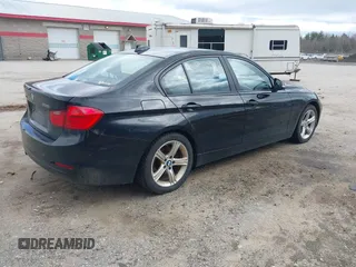 2013 BMW 3 Series 328i xDrive with VIN WBA3B5C5XDF597184, listed as a IAAI auction lot 42060785 with 205,559 mi miles. Bid and sale history available at carsss.com. Image 4.
