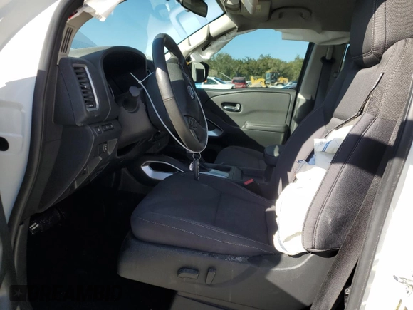 2024 Nissan Frontier SV with VIN 1N6ED1FK2RN657923, listed as a Copart auction lot 84277234 with 9,165 mi miles and Non repairable. Bid and sale history available at DreamBid. Image 7.