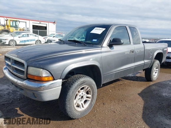 2004 Dodge Dakota SLT with VIN 1D7HG42N44S618405, listed as a IAAI auction lot 40895893 with 172,324 mi miles. Bid and sale history available at carsss.com. Image 2.