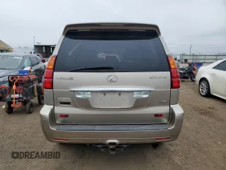 2004 Lexus GX 470 z VIN JTJBT20X740033069, wystawiony jako Copart lot #56011045 z przebiegiem 263 891 mil mil oraz Tytuł czysty. Historia ofert i sprzedaży dostępna na DreamBid. Obrazek 6.