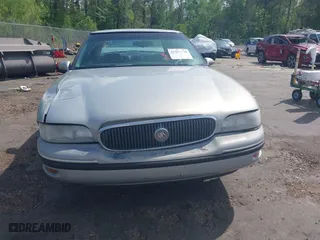 1998 Buick LeSabre Custom with VIN 1G4HP52K1WH412332, listed as a IAAI auction lot 41923320 with 201,306 mi miles. Bid and sale history available at carsss.com. Image 13.