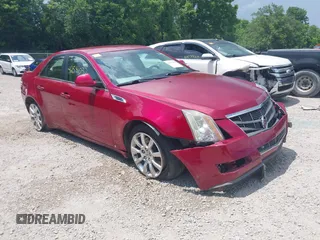 2008 Cadillac CTS RWD with VIN 1G6DM577880123498, listed as a IAAI auction lot 42591032 with 90,982 mi miles and . Bid and sale history available at DreamBid. Image 1.