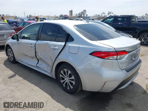 2022 Toyota Corolla Hybrid LE with VIN JTDEAMDE6NJ056705, listed as a IAAI auction lot 42032119 with 197,030 mi miles. Bid and sale history available at carsss.com. Image 3.