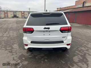 2021 Jeep Grand Cherokee SRT with VIN 1C4RJFDJXMC768325, listed as a Copart auction lot 52925255 with 14,833 mi miles and Clean Title. Bid and sale history available at carsss.com. Image 6.