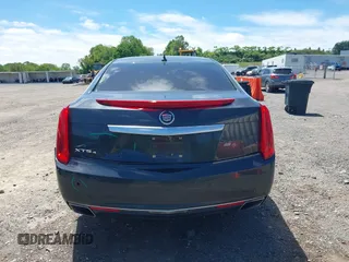 2013 Cadillac XTS Luxury z VIN 2G61R5S33D9101434, wystawiony jako IAAI lot #42290199 z przebiegiem 48 075 mil mil oraz . Historia ofert i sprzedaży dostępna na DreamBid. Obrazek 16.