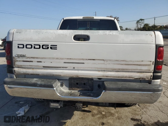 2000 Dodge Ram 2500 with VIN 3B7KC23Z6YG154595, listed as a Copart auction lot 75689054 with 332,564 mi miles and Salvage Title. Bid and sale history available at carsss.com. Image 6.