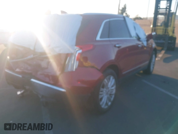 2019 Cadillac XT5 Premium Luxury FWD with VIN 1GYKNERS4KZ174349, listed as a IAAI auction lot 41614364 with 104,979 mi miles and . Bid and sale history available at DreamBid. Image 4.