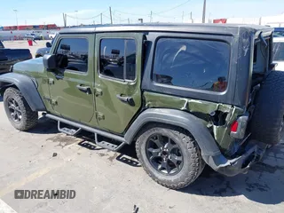2022 Jeep Wrangler Unlimited Sport with VIN 1C4HJXDG5NW113205, listed as a IAAI auction lot 41836171 with 30,446 mi miles and . Bid and sale history available at DreamBid. Image 3.